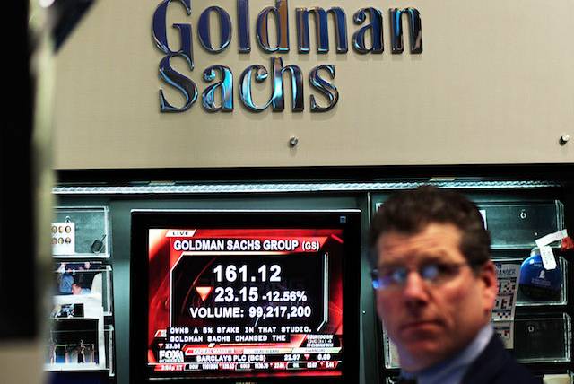 An arrow showing the alleged direction of racial acceptance at Goldman.